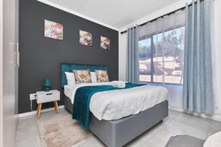 Main bedroom with feature wall